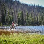 Cierra Fishing on Horseback