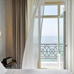 Junior Suite Sea Front with Balcony - Bedroom