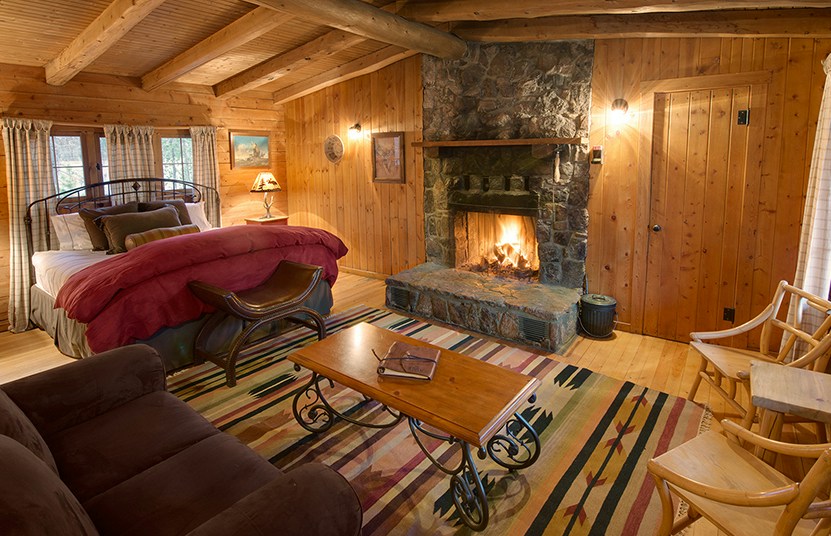Ranch House West Cabin - Bedroom & Living Area